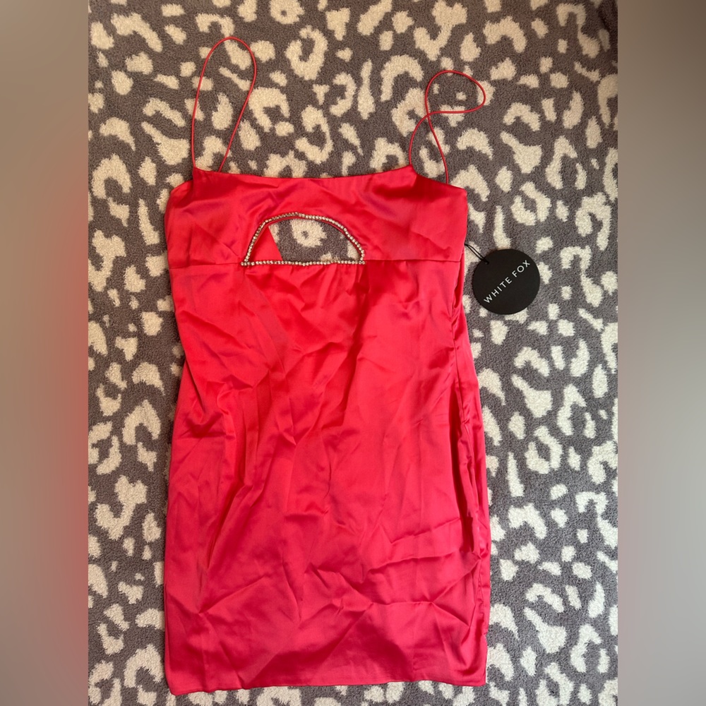 Never worn mini dress. Pink with rhinestone cut out